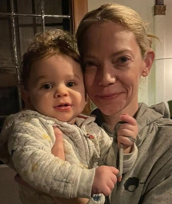 Riki Lindhome with her baby.